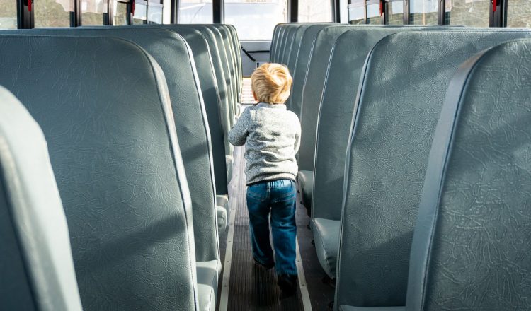 Child on School bus